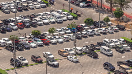 Aerial top view of parking lot cars of the business center timelapse