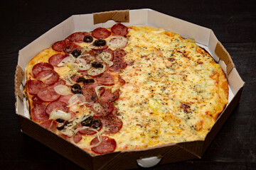 Traditional Brazilian pizza half pepperoni sausage and half four cheeses