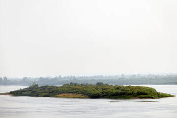 Calm foggy river distance.