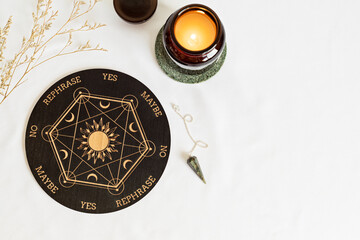Pendulum board for divination, fortune telling or communicating with spirits. Magical crafting,...