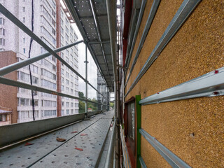 Flammable cladding issues due to fire safety risks. Re-cladding work in progress on a block of...