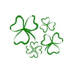 Set of Irish shamrock isolated on white background Brush stroke Green clover with three and four leaves symbol of a St Patrick day Vector illustration