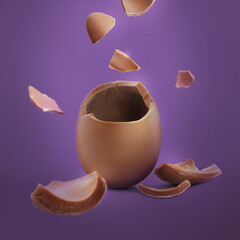 Exploded milk chocolate egg on purple background