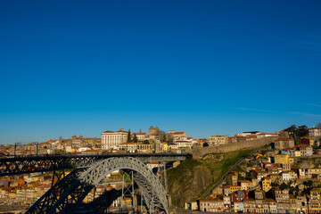 Spectacular Sunset Silhouette: The Majestic Dom Luís Bridge Adorned in Porto's Evening Glow