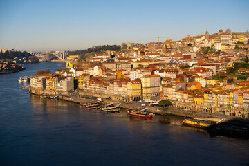 Fototapeta premium Sunset Symphony: Porto's Enchanting Beauty Unveiled in the Golden Hour