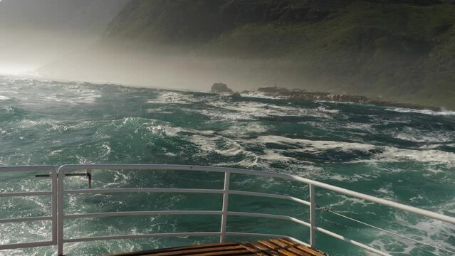 Ocean storm waves create bumpy ride for tour boat off Cape Town, RSA