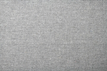 Fototapeta na wymiar 質感のある灰色の布地の背景テクスチャー