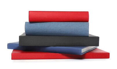 Stack of different hardcover books on white background