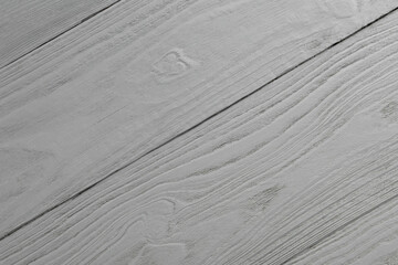 Texture of light grey wooden surface as background, closeup