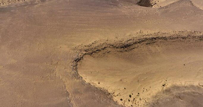 Aerial footage of Kasuy Dunes In the Southern Negev and Arava region. Amazing golden sand dunes. Filmed in C4K Apple ProRes 422 HQ