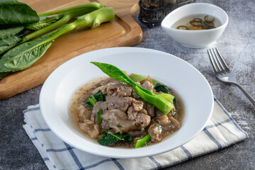 Noodles in Gravy with Pork on the table