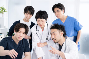 Fototapeta premium Doctor and nurse discussing a difficult case