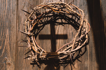 Jesus Crown Thorns and nails and cross on a wood background. Crucifixion Of Jesus Christ. Passion...