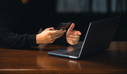man working on laptop computer at home