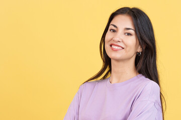 Fototapeta premium Happy hispanic woman smiling at the camera