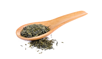 dry tea in wood spoon on transparent png