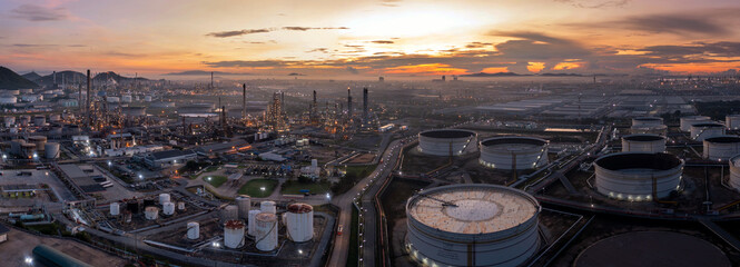 Aerial view drone of oil storage tank with oil refinery factory industrial. Oil refinery plant at...