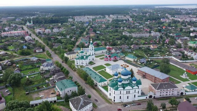 View from drone of architectural complex of Epiphany Monastery, Orthodox convent with cathedrals in center of Russian city of Uglich on summer day, Yaroslavl region . High quality 4k footage