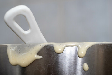 Bowl of cake batter, mess after baking.
