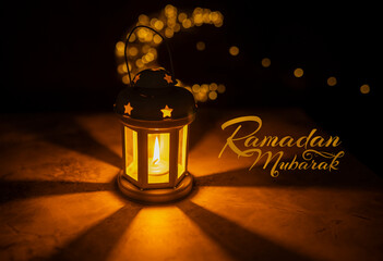 Ramadan Mubarak greetings 2023, Traditional Arabic lantern lamp on a dark background