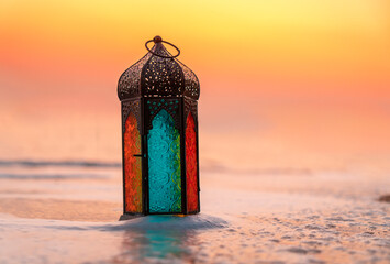 Islamic concept Lantern lamp image, Traditional Arabic Lantern on the beach 