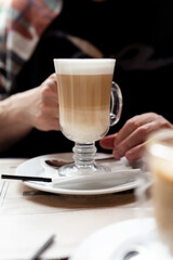 Still life of latte coffee in double wall thermal Glass