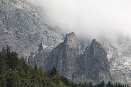 Low angle view of mountain during foggy weather