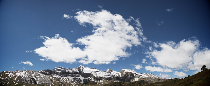 Scenic view of Canfranc Valley against cloudy sky