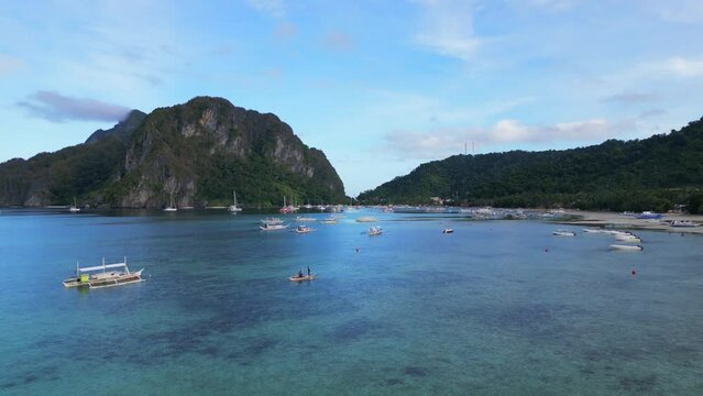 A view of the traditional boats near Corong Corong beach in Palawan, Philippines