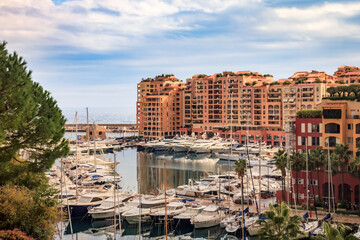 Fototapeta na wymiar Monaco Ville Marina with luxury yachts and expensive apartments in Monaco