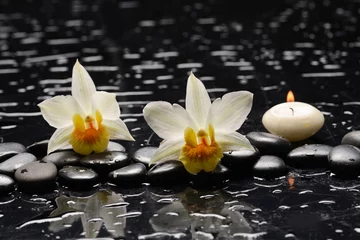 Foto op Plexiglas Spa still with white orchid, close up,candle with black zen stones, © Mee Ting