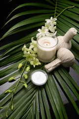 Gartenposter Healthy Concept, white orchid flower ,spa ball,salt in bowl,, Spa with candle and stone spa © Mee Ting