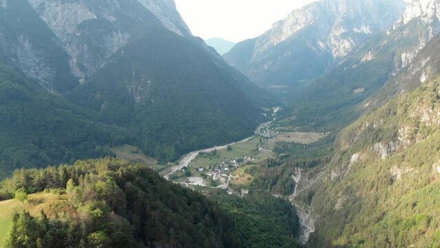 Aerial view of Log pod Mangartom village in Soca valley in Slovenia, summer day