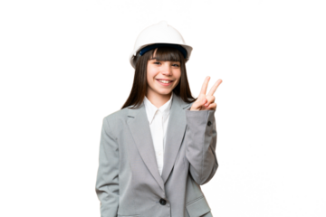 Little girl playing as a architect with helmet and holding blueprints over isolated background smiling and showing victory sign