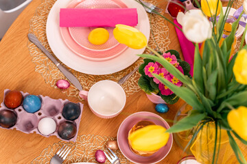 Obraz na płótnie Canvas easter table setting with easter eggs