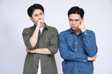 Two Asian men on background