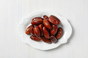Concept of tasty food, dates, top view