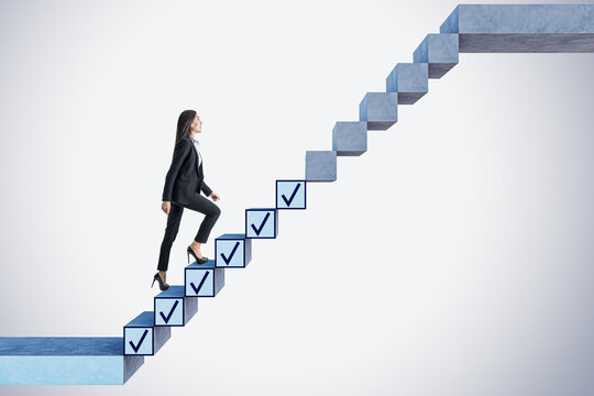 Goals Achievement, Business Success And Checklist With Businesswoman Climbing Up The Check Marks In Form Of Stairs On Abstract Light Background