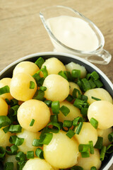 Concept of tasty food with boiled young potatoes, close up