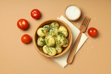 Concept of tasty food with boiled young potatoes, top view