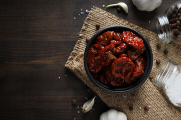 Concept of tasty food - sun-dried tomato, space for text