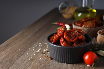 Concept of tasty food - sun-dried tomato, space for text