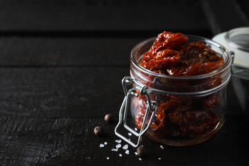 Concept of tasty food - sun-dried tomato, space for text