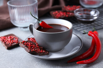 Concept of delicious food - chocolate with pepper and hot chocolate with pepper