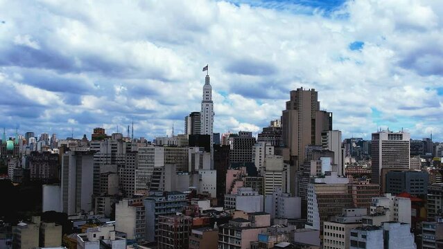 Drone shot around the cityscape of in sunny Santa Ifig&ecirc;nia, Sao Paulo, Brazil