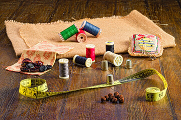 sewing accessories on a wooden background