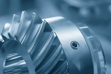 Close up  the spiral bevel gear part in the light blue scene.