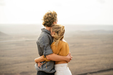 Romantic young couple embracing each other