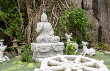 The sculpture of a marble Buddha on the Marble Mountains in the Da Nang region. Vietnam