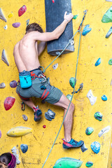 climbers on artificial climbing walls